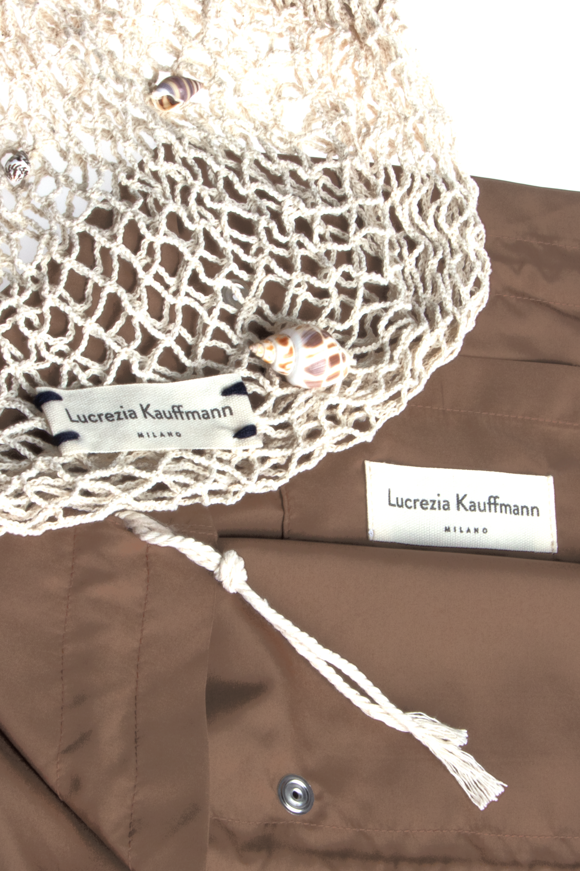 Dettaglio borsa a rete lucrezia kauffmann colore marrone , dettaglio rete e fodera interna